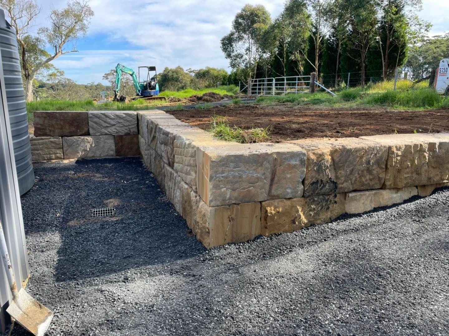 Sandstone retaining wall built by Echidna Contracting on the Central Coast